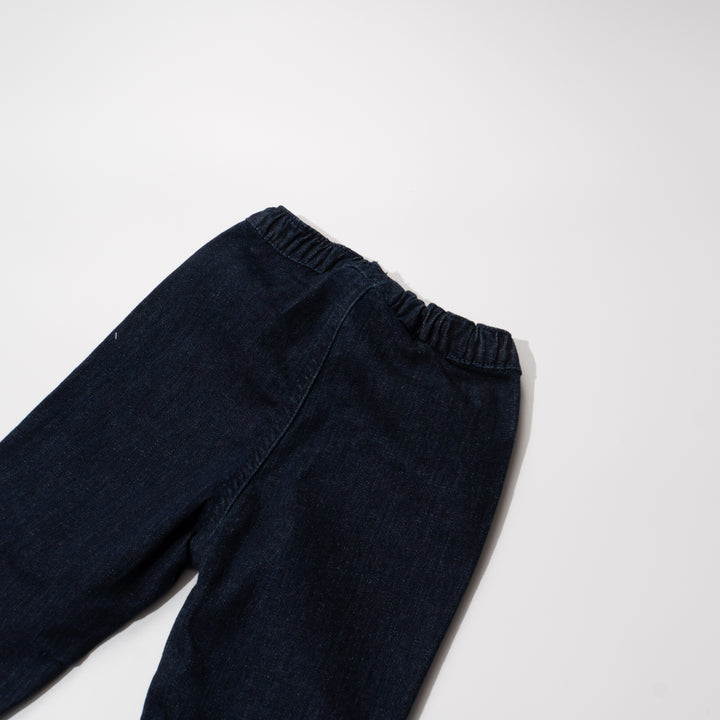 Indigo black jeans for girls, floral embossed prints above the hem and below the waist. A denim ribbon tie on waistband. Two front pockets included.Elasticated.  