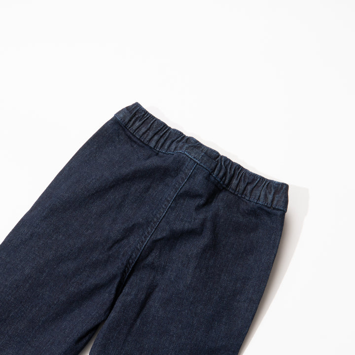 Indigo black jeans for girls, floral embossed prints above the hem and below the waist. A denim ribbon tie on waistband. Two front pockets included.Elasticated.  