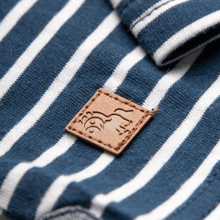 Stripped long sleeve, blue top, a grey pocket, poney logo strap. 