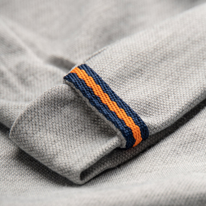 Melange Joggers, pockets included and embroidered logo Elasticated navy waistband, matching cords included.