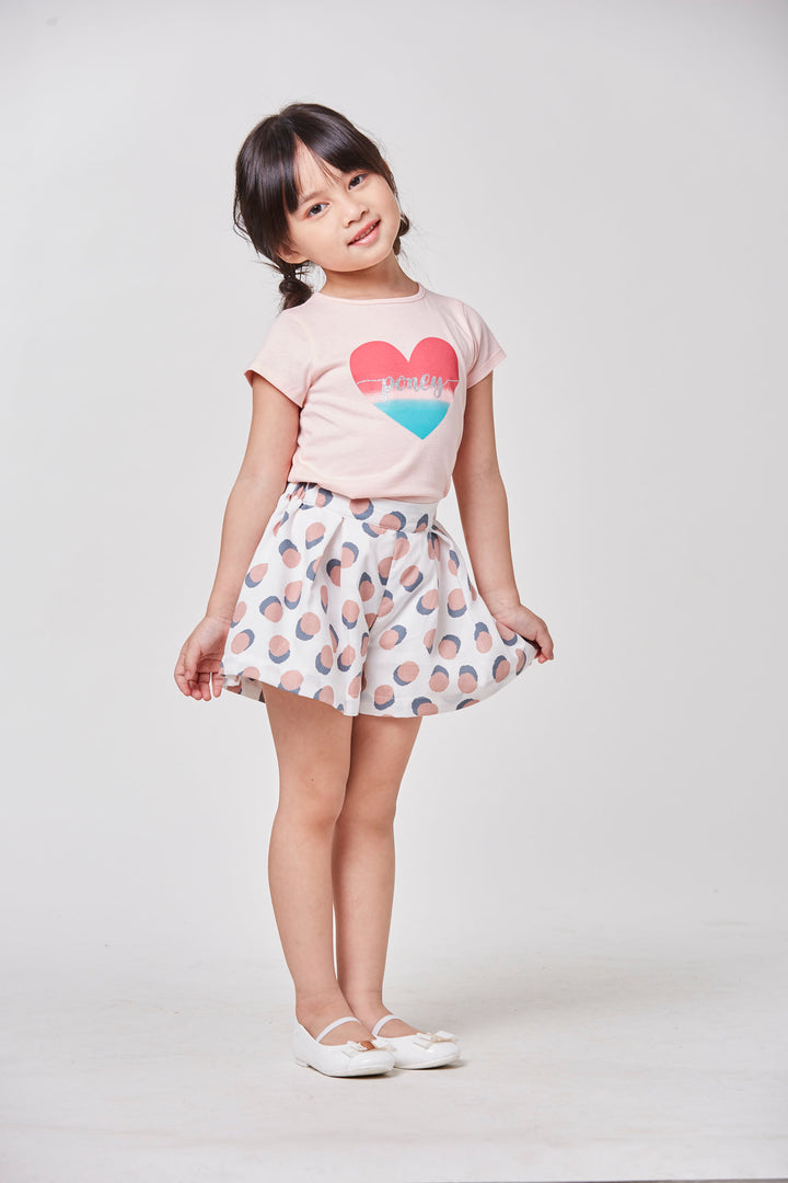 Light pink 'poney' heart t-shirt, short sleeve, a buttoned nape. 