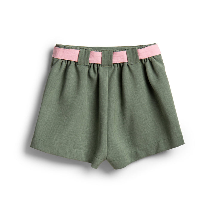 Green Pocket shorts, a pink bow waist fastening at the front. 