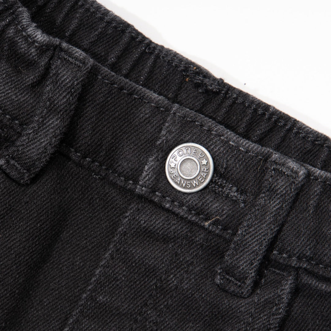 Elasticated Black Jeans, front zipper and button fastening. Embroidered back pockets, adjustable button included in the waist band.  