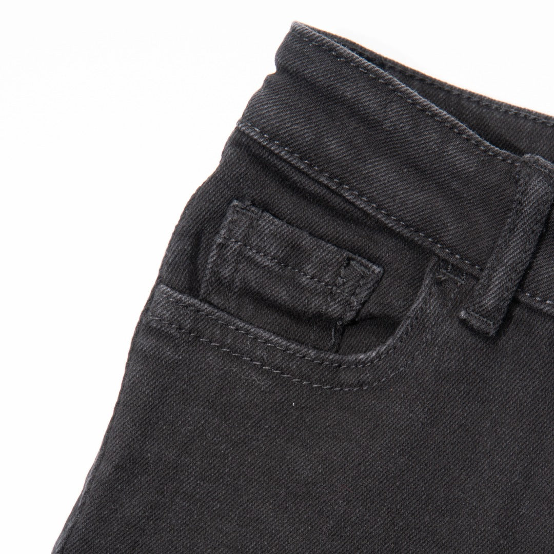 Elasticated Black Jeans, front zipper and button fastening. Embroidered back pockets, adjustable button included in the waist band.  