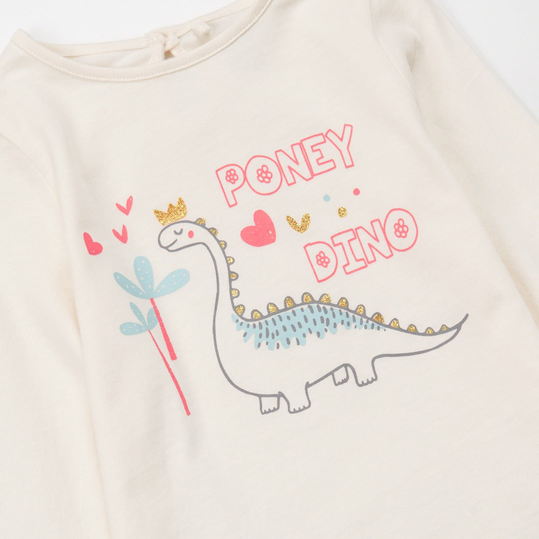 Creme Long sleeve t-shirt with a chunky dino print, elasticated cuffs and a buttoned nape.