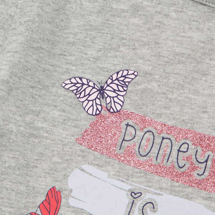 Melange Long Sleeve T-Shirt, with colourful embossed 'poney is my best friend' print. Fastened at the back.