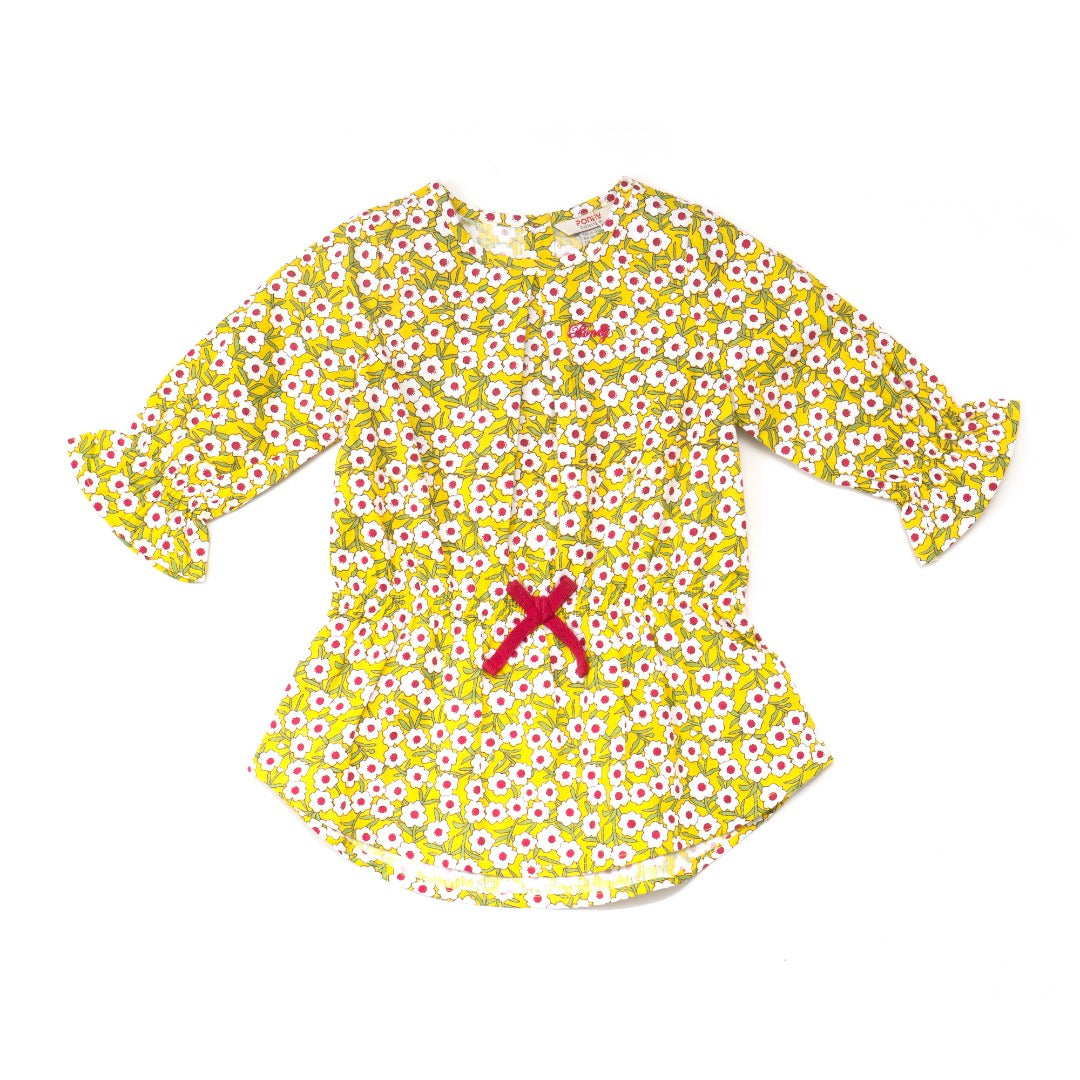 Yellow floral blouses, ruffled sleeves, a ribbon and a ruffled waist. Button fastenings included. 