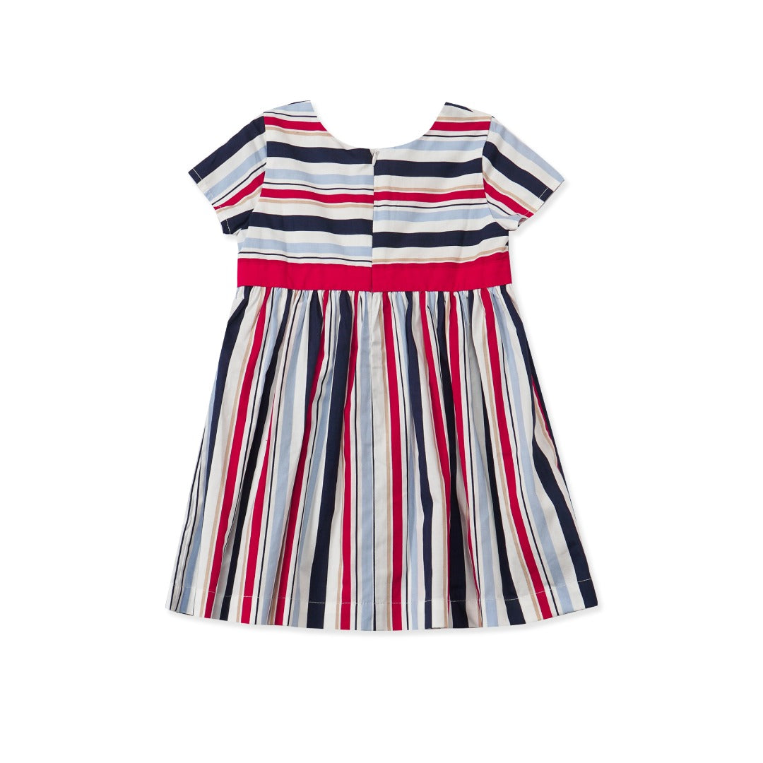 Wide striped multi-color dress, a red double bow belt, and zipper at the back.