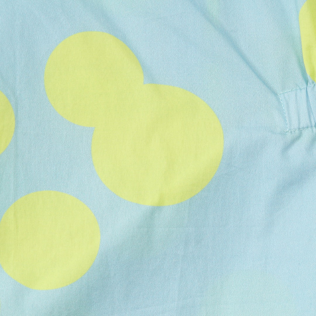 Blue and Neon yellow dotted dress, with elasticated frill on side, a zipper and embroidered logo added. 