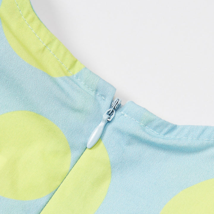 Blue and Neon yellow dotted dress, with elasticated frill on side, a zipper and embroidered logo added. 