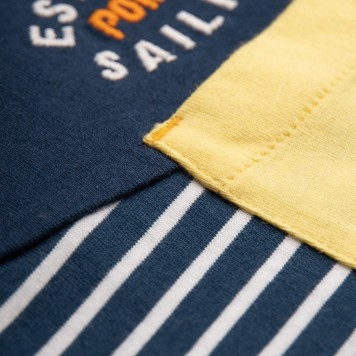 Navy, Lining and grey top with a yellow pocket and poney logo strap on the left. 