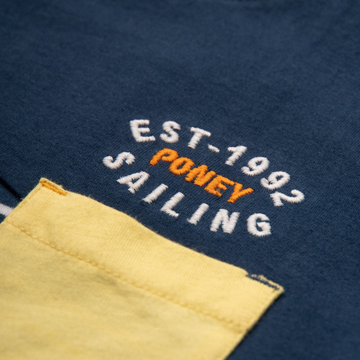 Navy, Lining and grey top with a yellow pocket and poney logo strap on the left. 