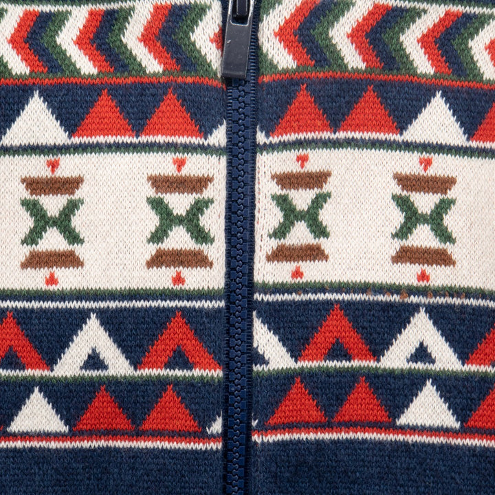 Red, whites and green on a navy woven, tribal jacket with a hoodie. knitted tribal patterns on Upper yoke.  front fastening of a zipper, rib-knit cuffs and hem. 