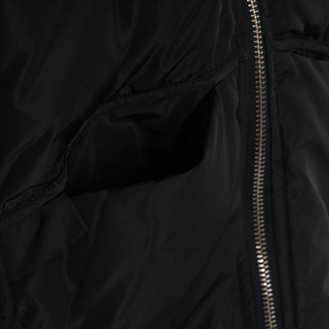 Hooded, Black, Heavily padded jacket. Front zipper, long sleeves and large front pocket. 