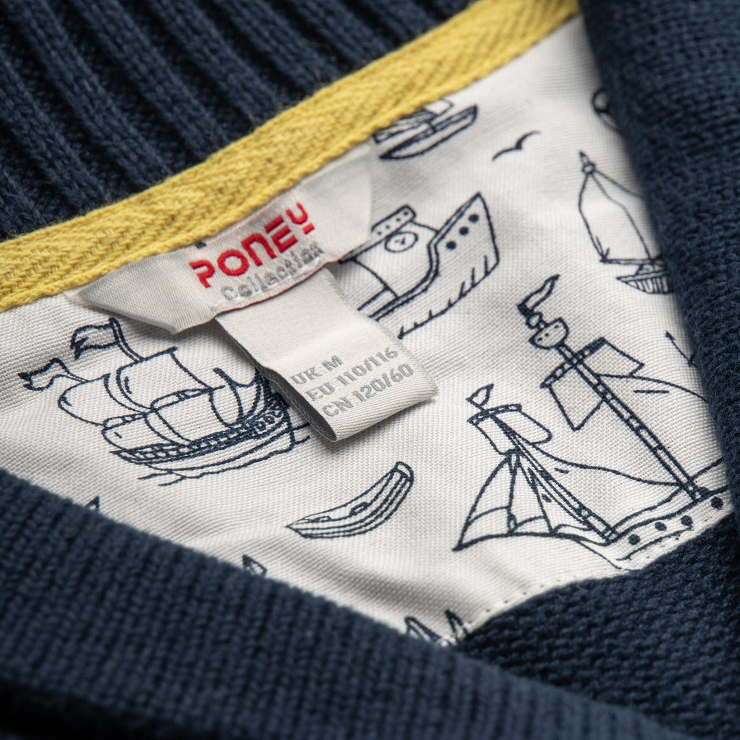 Navy Colour, Mariner Cardigan, white and blue stripe body, yellow rib-knit hem line. blue rib knit cuffs and neckband.