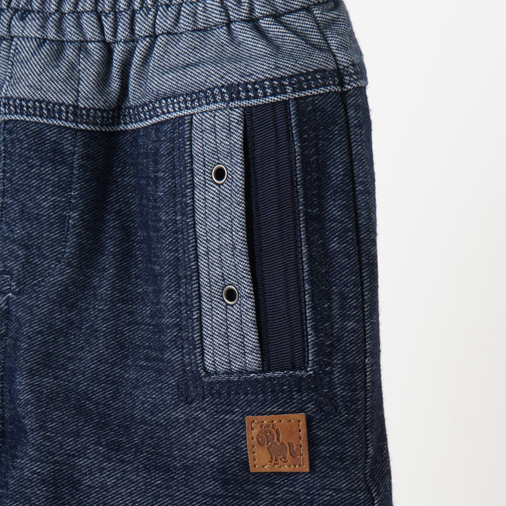 Denim Shorts, A stretchy waistband, two back pockets, a poney logo panel. 