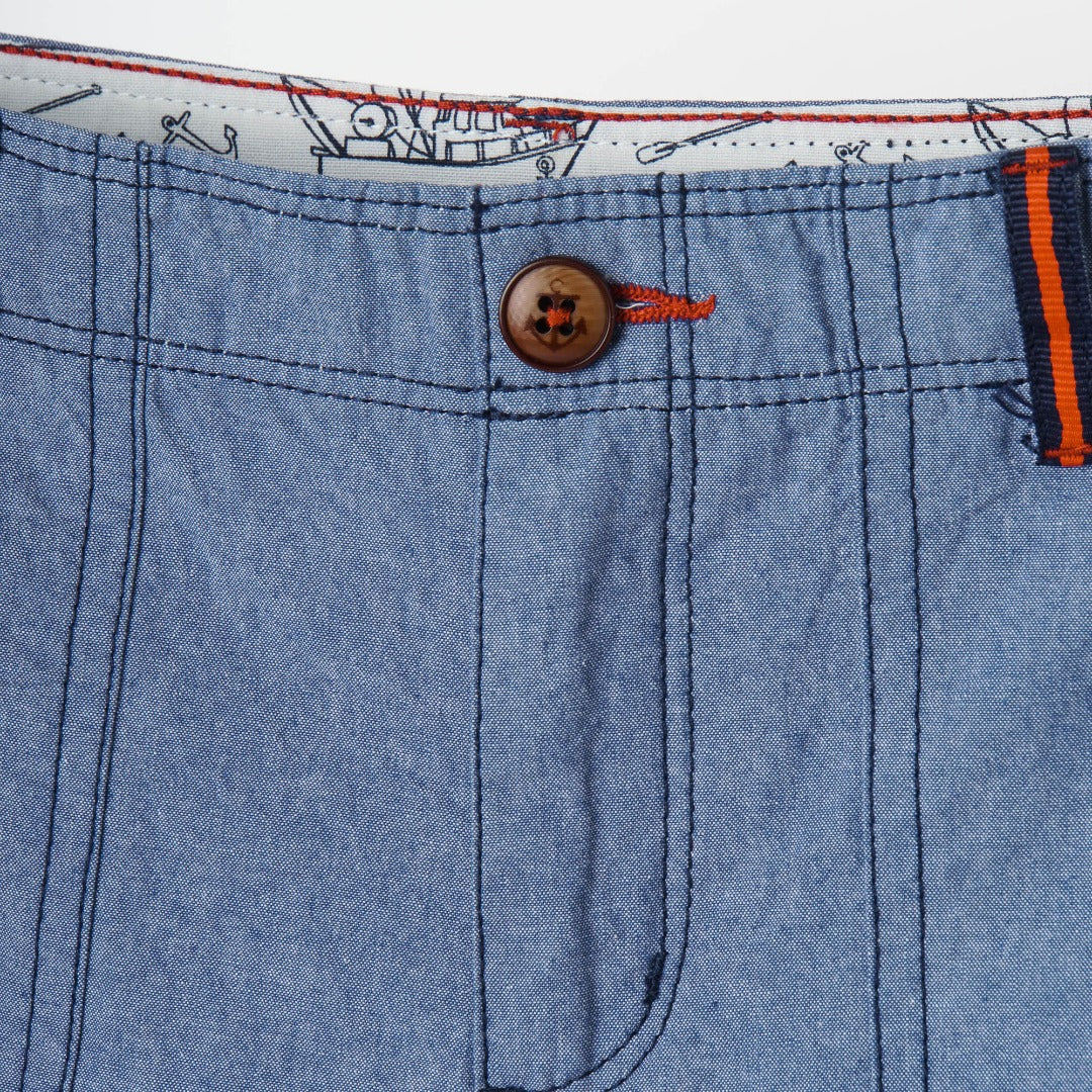 Blue cropped pants, front button and zipper fastening, two pockets each included at the front and backside. 