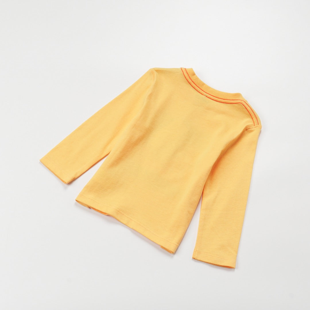 'Super Cool Monster' printed, yellow top, long sleeves, shoulder buttons. 