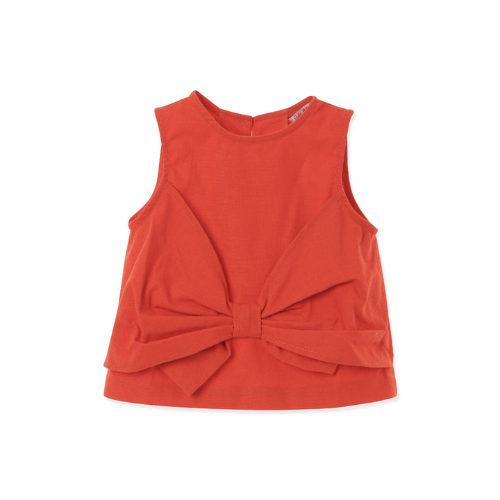 Red sleeveless blouse, fancy large bow. Back fastened by two buttons. 