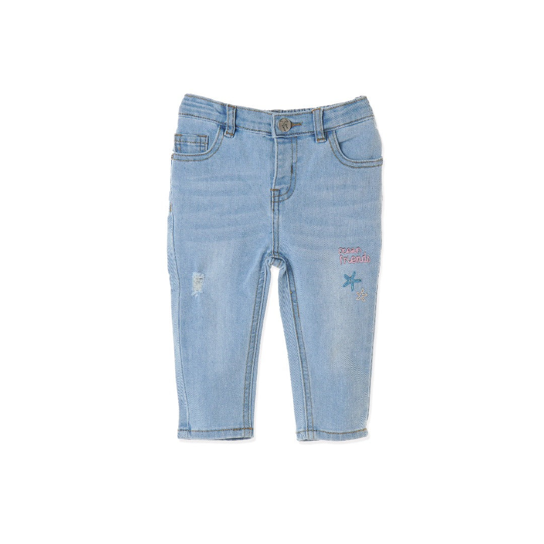 Slightly distressed, faded, embroidered, embossed, denim for girls with an ocean theme. Waistband Adjustments, front button/zipper fastening included. 