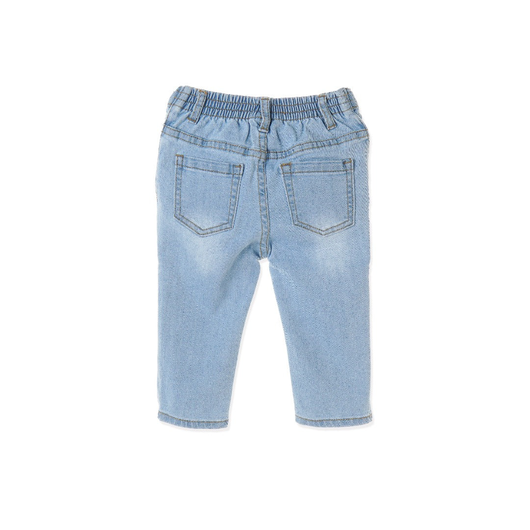 Slightly distressed, faded, embroidered, embossed, denim for girls with an ocean theme. Waistband Adjustments, front button/zipper fastening included. 