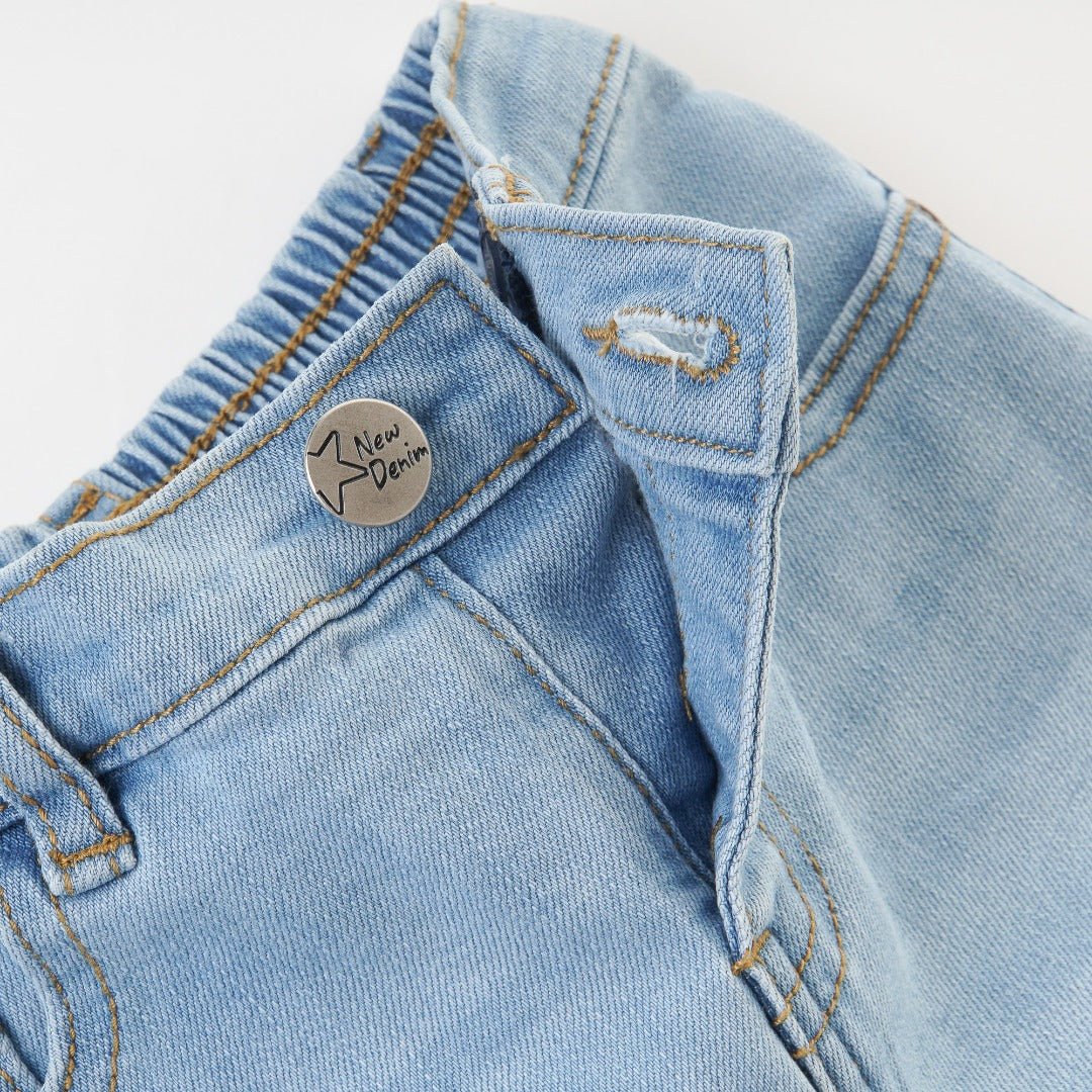 Slightly distressed, faded, embroidered, embossed, denim for girls with an ocean theme. Waistband Adjustments, front button/zipper fastening included. 