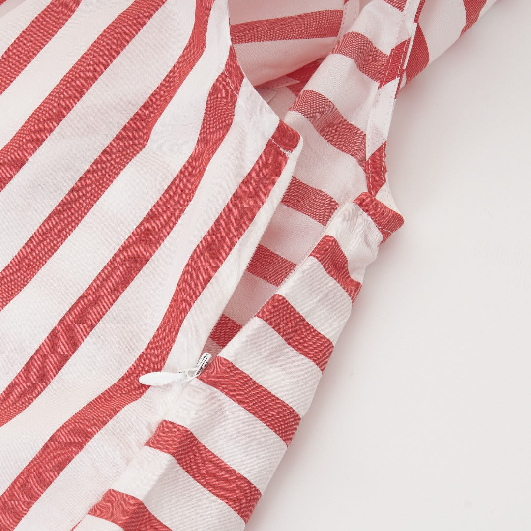 Red striped, sleeveless blouse, with a fancy large bow, zipper on the side.