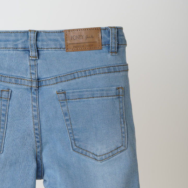 Smart, traditional, slightly distressed denim with front button/zipper fastening. Front and back pockets included, stitched slit hem at the bottom. 