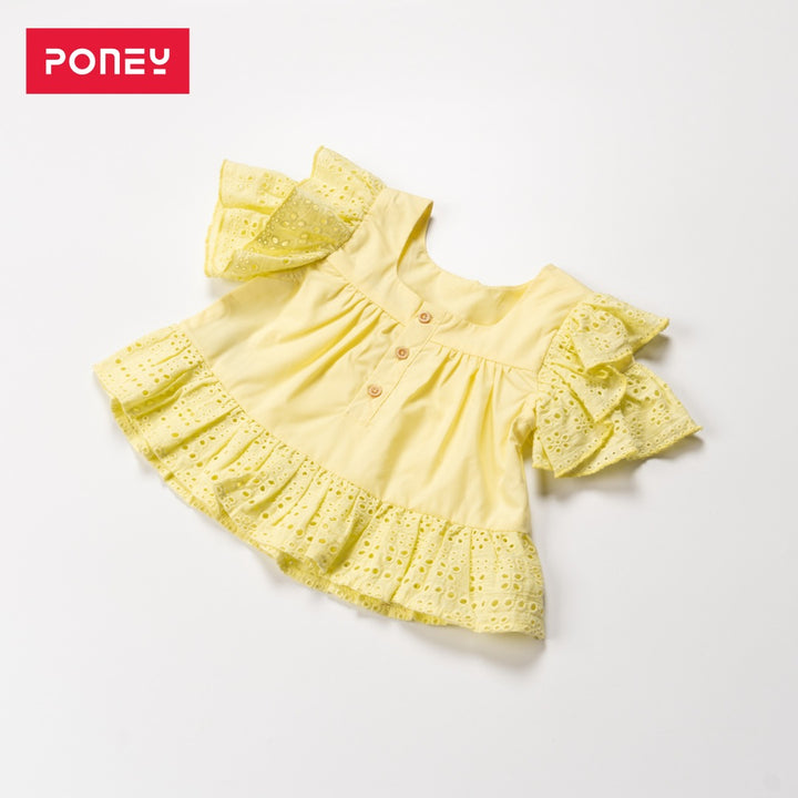 Double frilled sleeves and hem blouse, buttons at the front. Embroidered poney logo below the neck. 