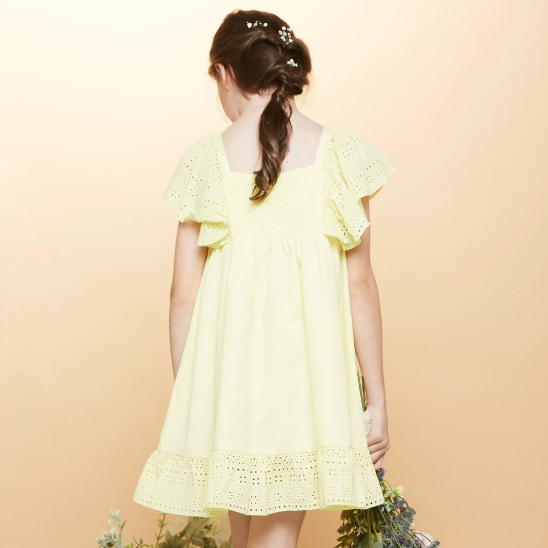 Yellow dress, lacy sleeves, ruche upper bodice and lacy frills added at the bottom. 