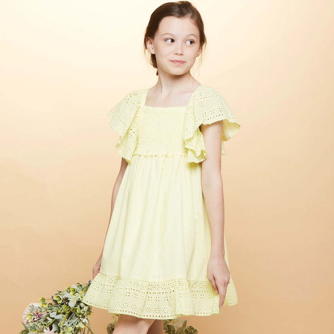 Yellow dress, lacy sleeves, ruche upper bodice and lacy frills added at the bottom. 