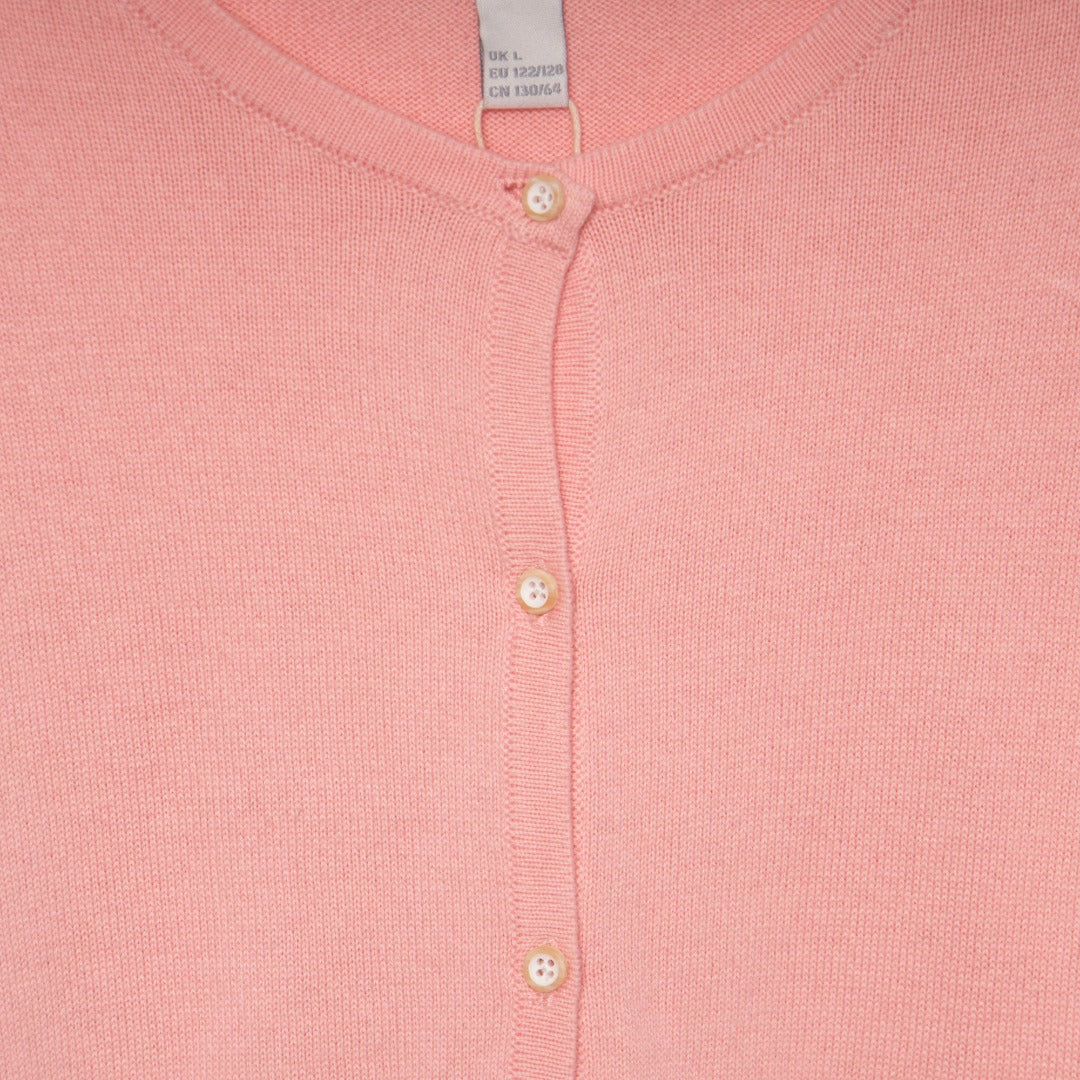 Comfortable tea pink, long sleeve cardigan, fastened from the front with pearl white buttons.