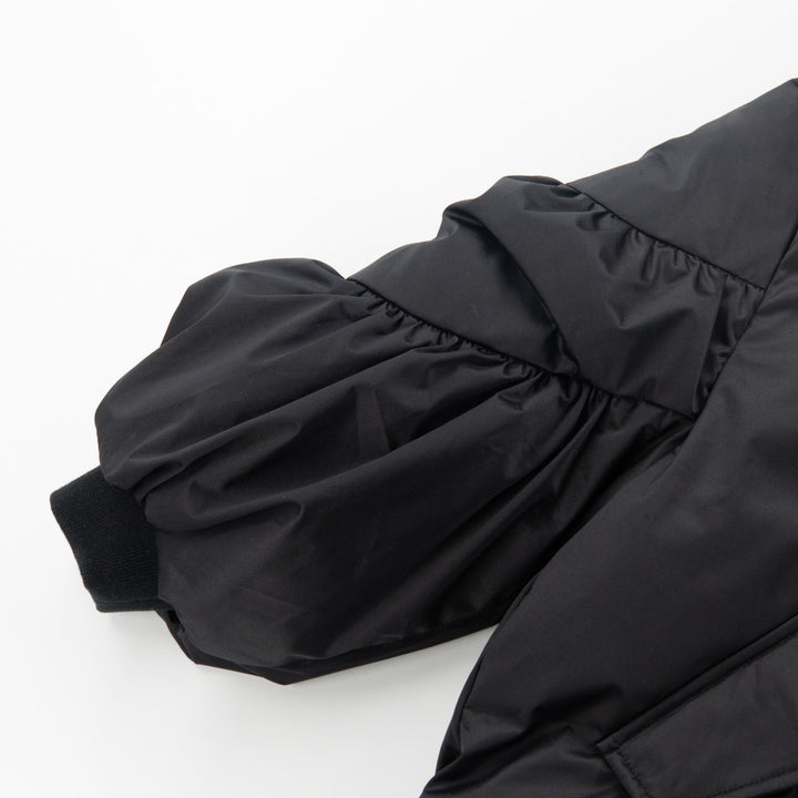 Double Puff sleeve, Black hooded jacket, two front pockets, zipper fastening and rib-knit cuffs. 