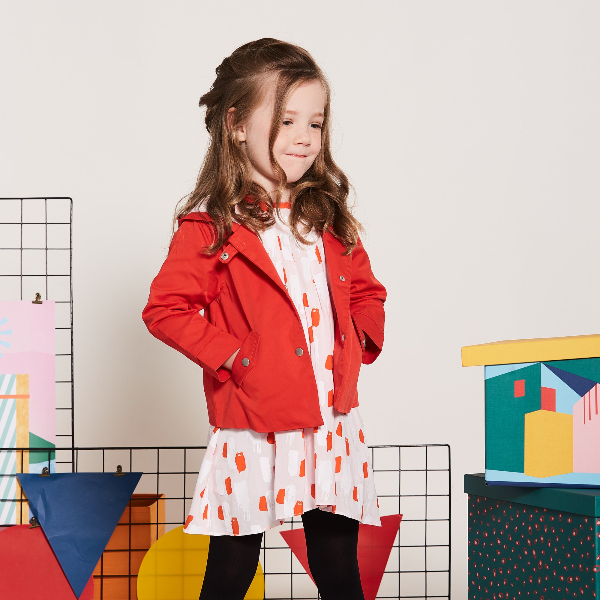 Orange Cotton Jacket, Lined by next-to-skin fabric , two Front pockets, front lining fastened by snap buttons, heart shaped logo embroidered at the front.